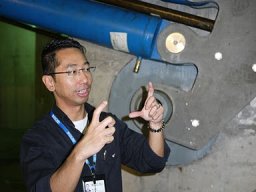Mr Chung explaining the maintenance of the cable